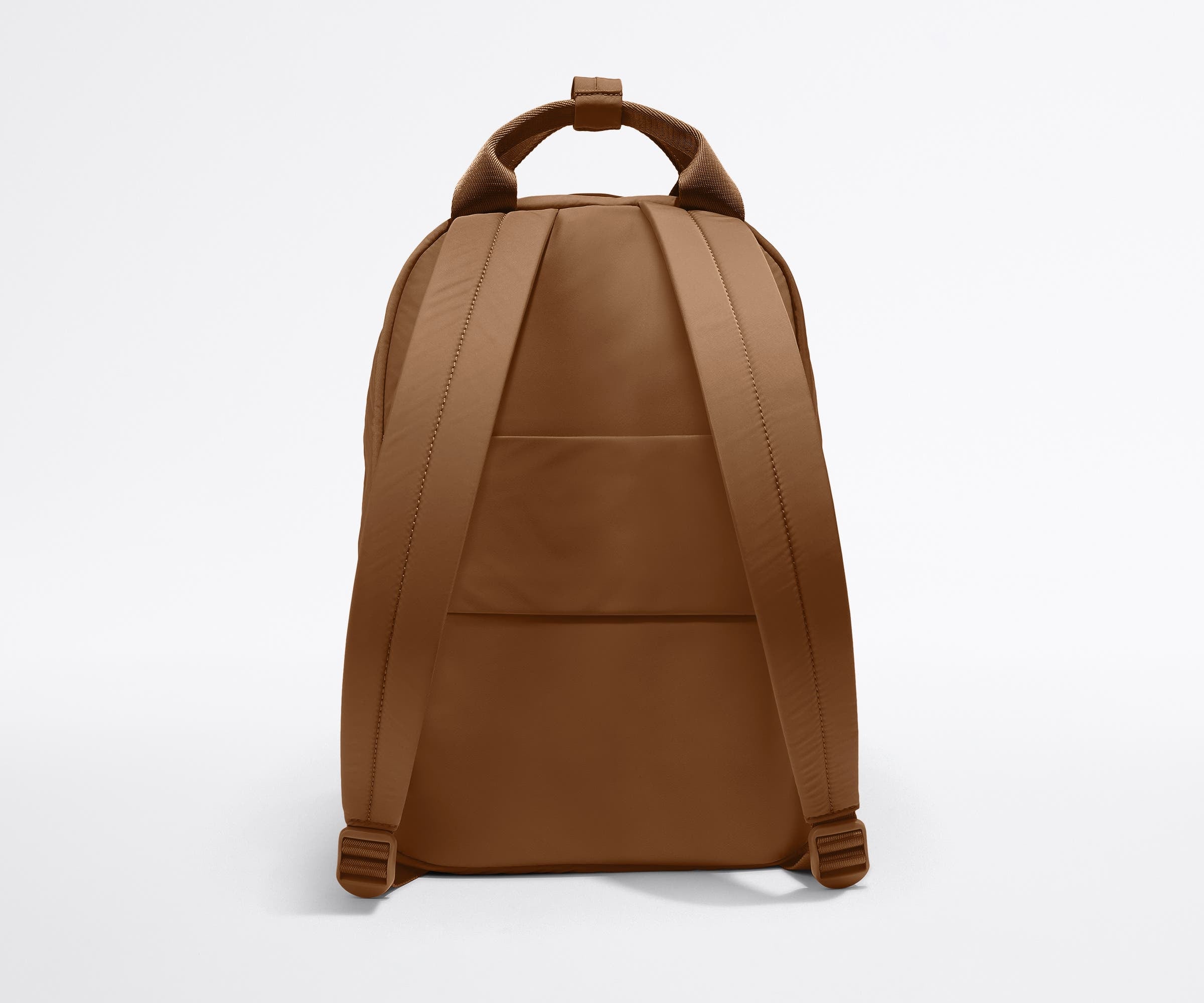 Padded shoulder straps and trolley sleeve on the back of the Featherlight Backpack