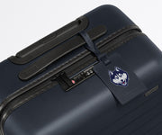 UConn ® Collegiate Luggage Tag on a matching UConn ® Collegiate Bigger Carry-On suitcase