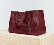 Angled view of the Active Tote 45L with the handles down