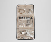 Unfolded Hanging Jewelry Oragnizer packed with jewelry and shown with the hook for easy hanging