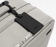 Black leather luggage on that comes with the Softside suitcase