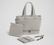 Tote with the included stroller clips, carry-all pouch, and changing pad