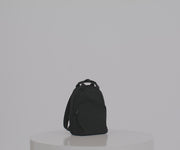 Video of a person packing the Featherlight Backpack with daily essentials