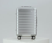 360-view of a Silver Aluminum suitcase and its features