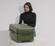 Video of a person packing a Trunk checked suitcase