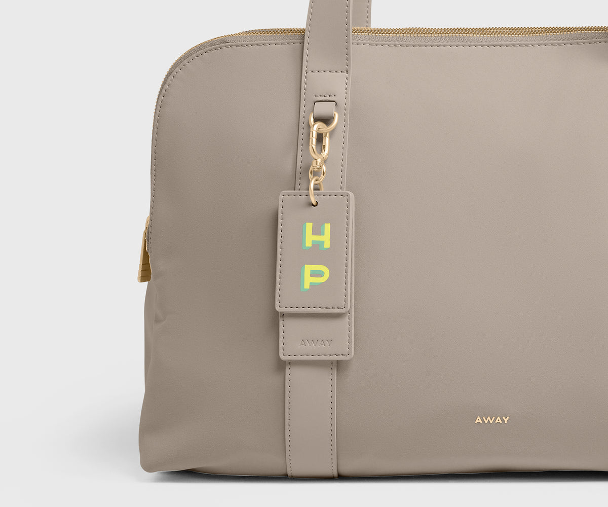 Signature Triple Zip Duffle in Dune Taupe